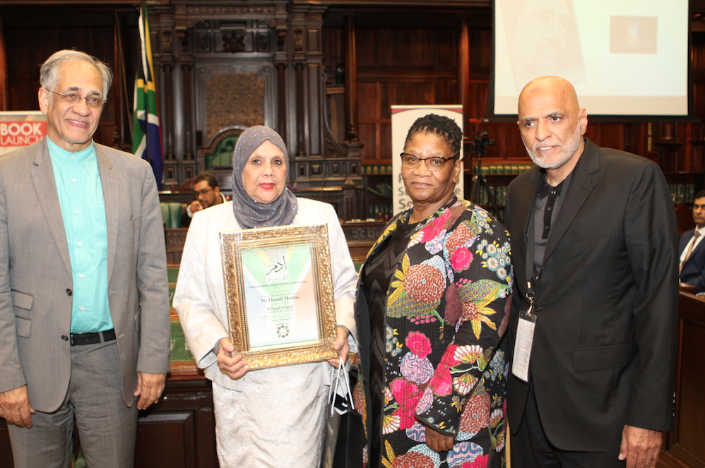 CAPTION: L-R. The author Enver Surty, Nadia Collier (Awqaf SA), Thandi Modise, Speaker of Parliament and Haroon Kalla (Awqaf SA).